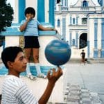 Children playing in a courtyard. Tehuantepec, Oaxaca state, Mexico, 1985